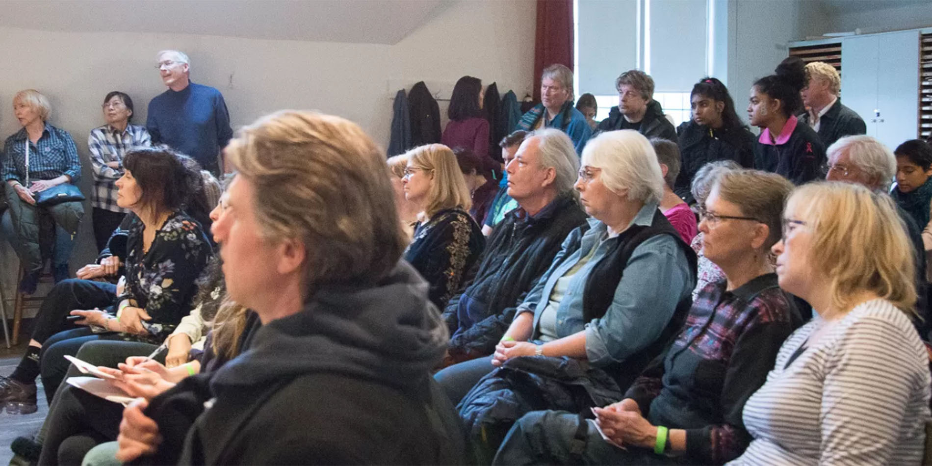 group of people listening to lecture