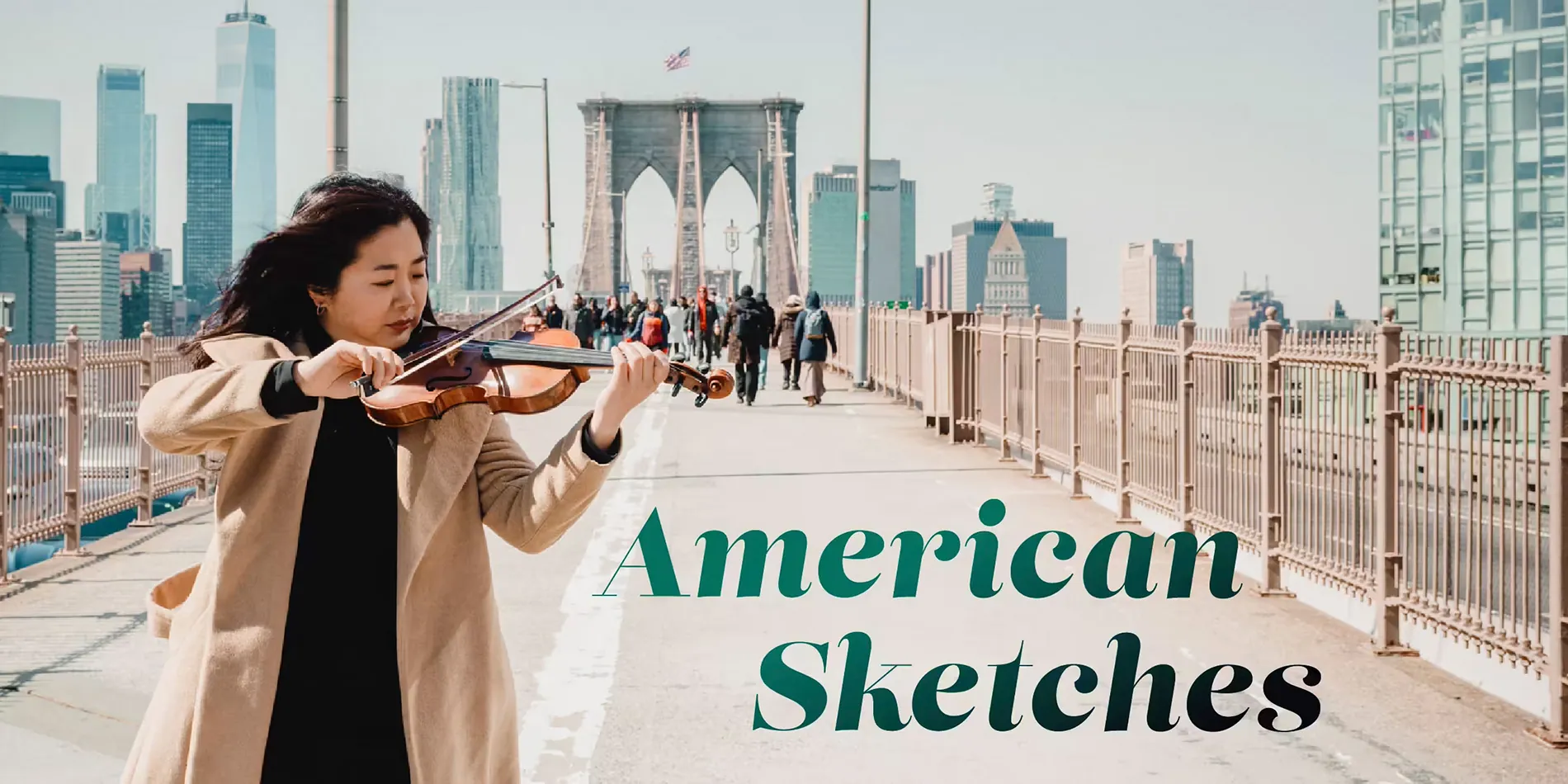 woman playing violin on bridge