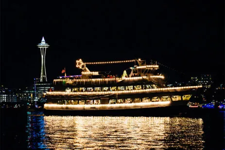 ship on lake union with holiday lights