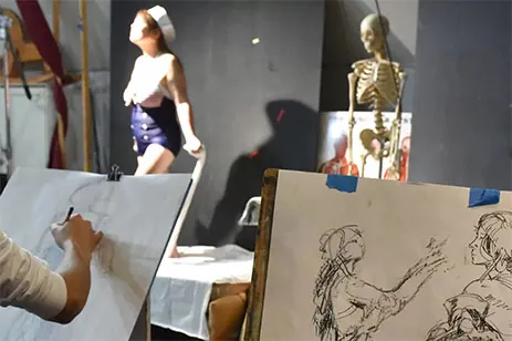 people sketching models