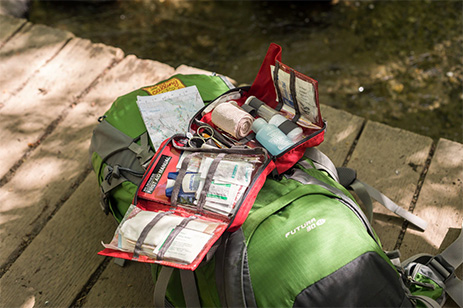 first aid kit on backpack
