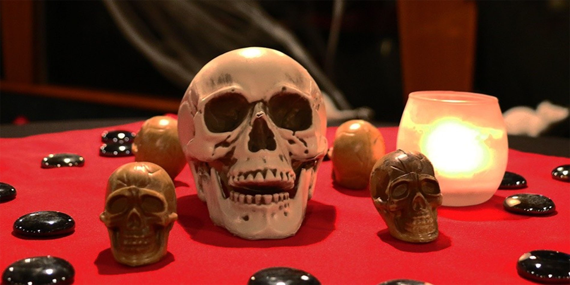 skulls on red table