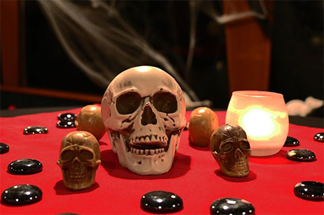 skulls on red table