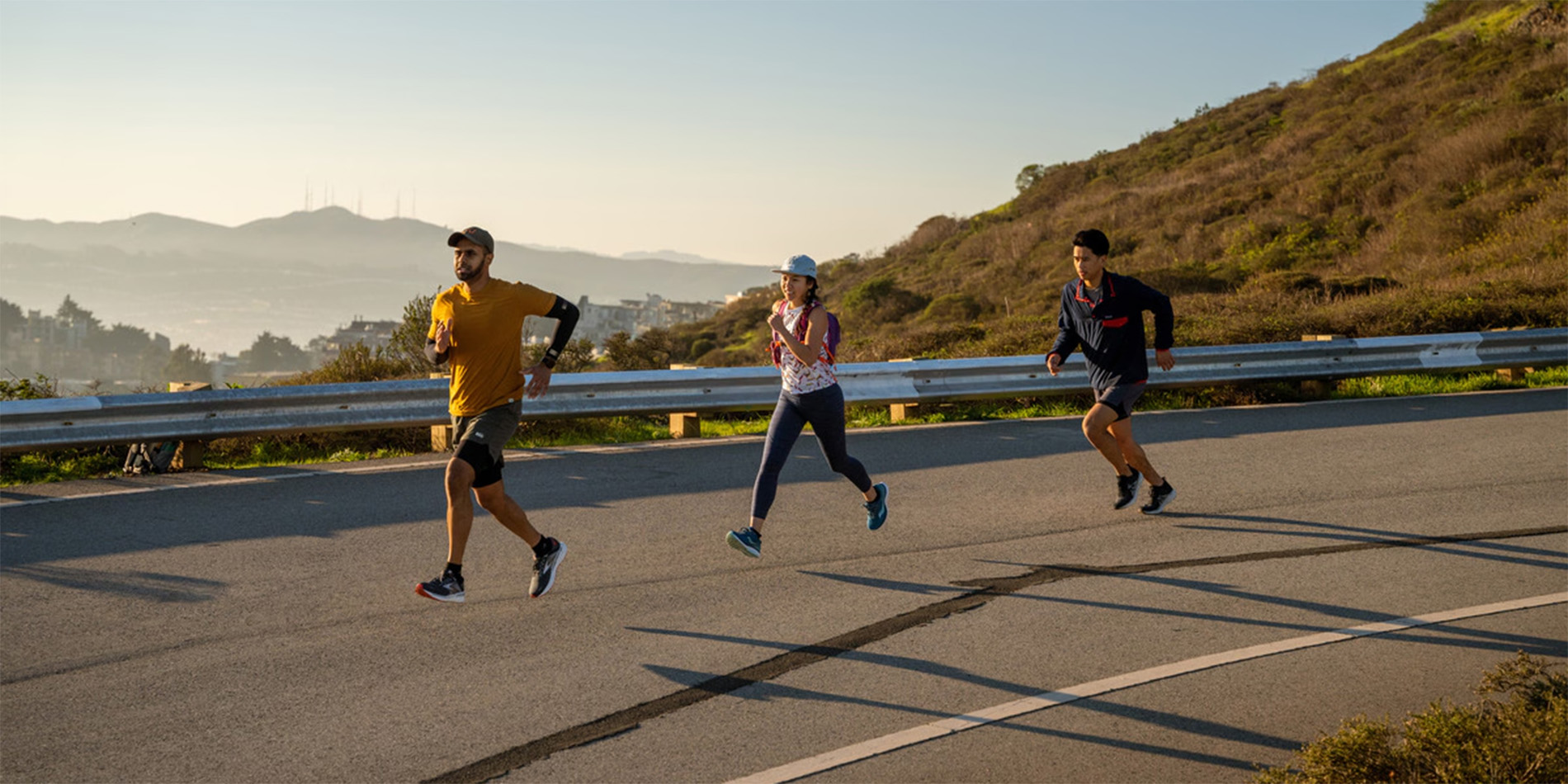 three people running