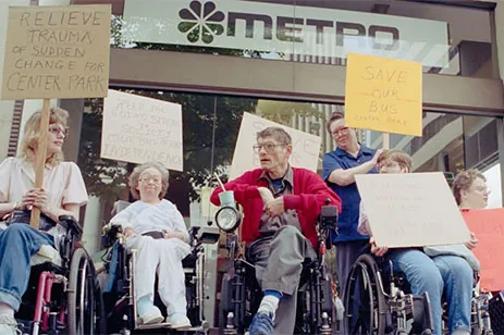 Group of people protesting disability discrimination