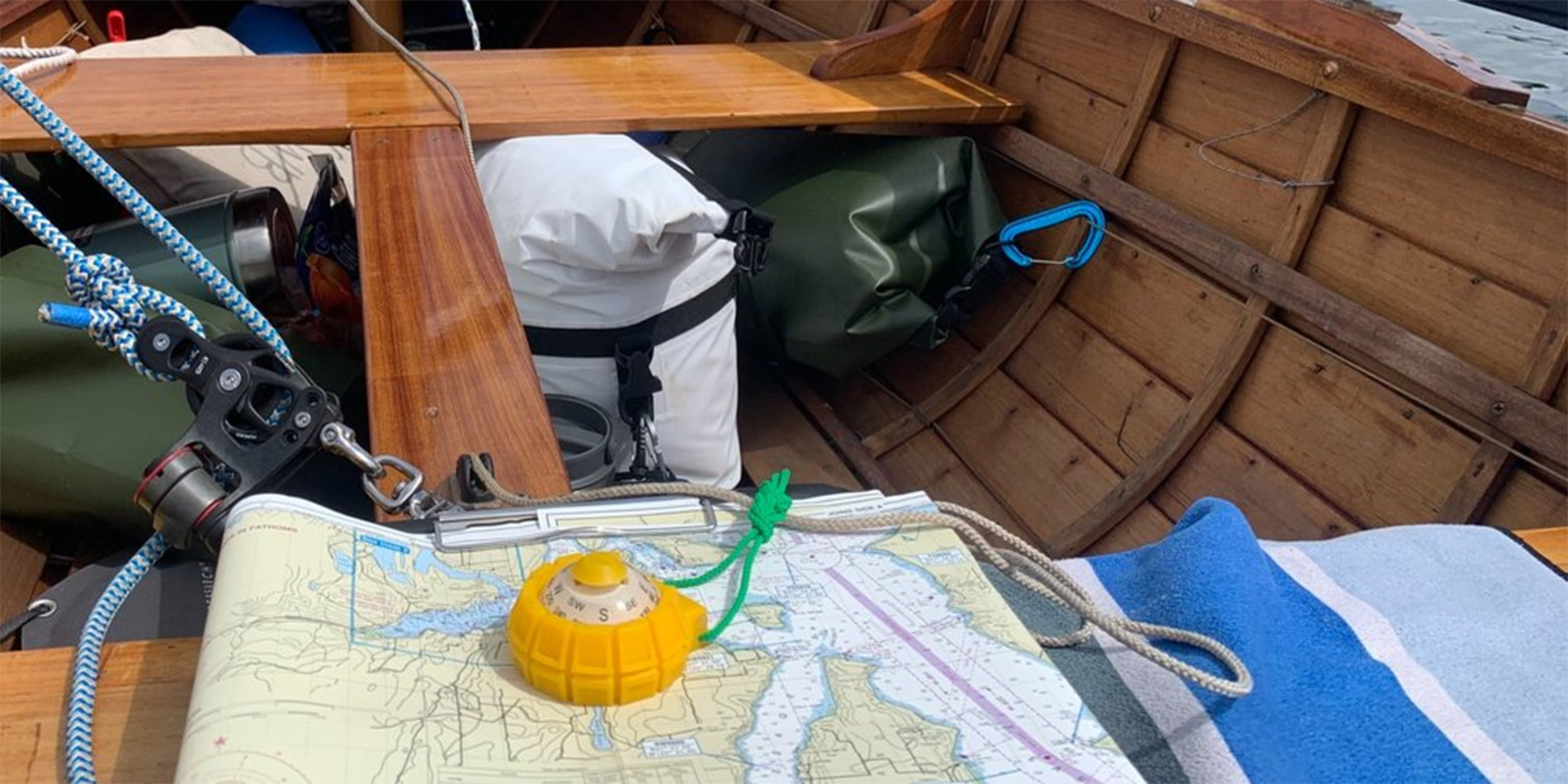 map & compass on boat