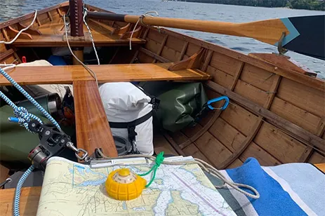 map & compass on boat