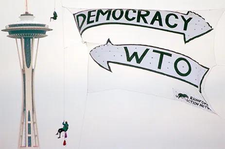 democracy/wto sign and space needle