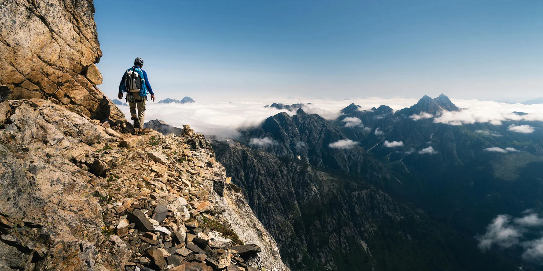 person hiking in mountains